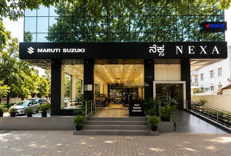 Front exterior display of NEXA Mandovi Motors premium car showroom near Palace Grounds Bengaluru